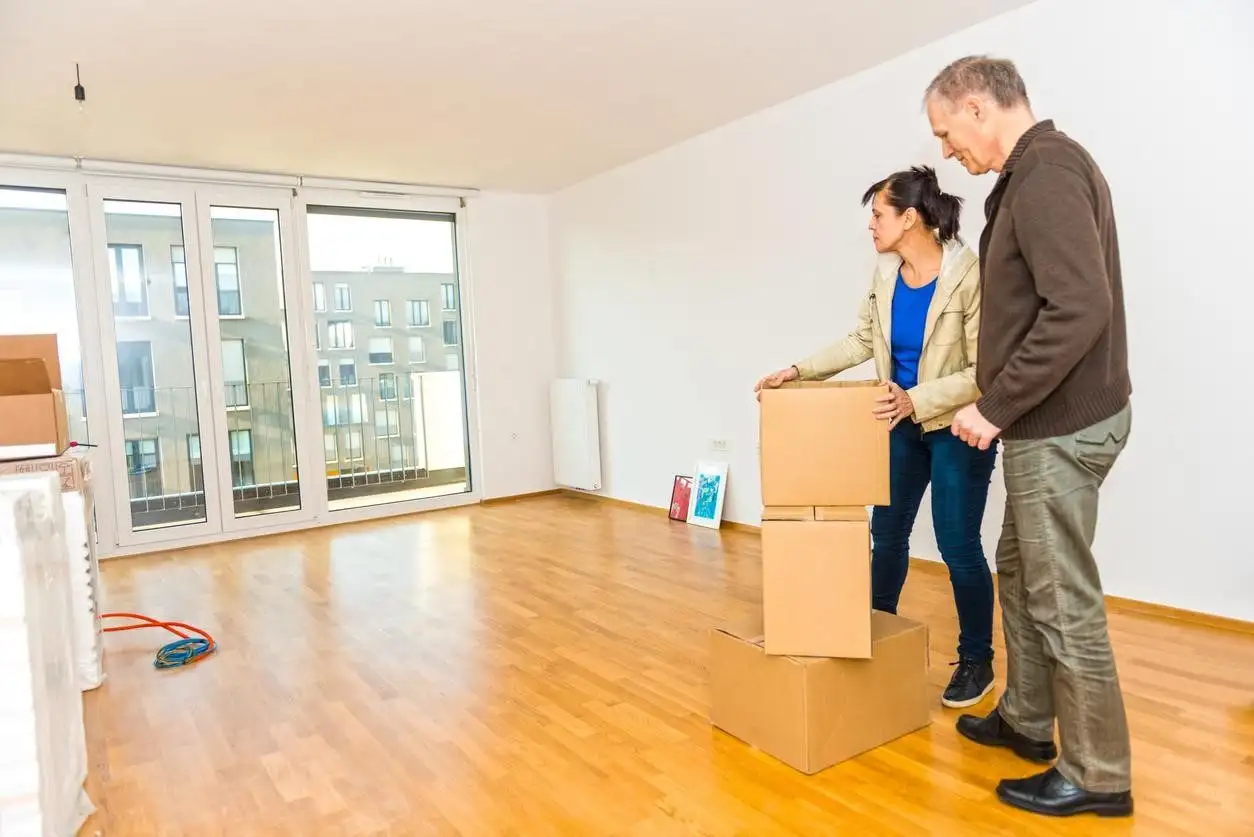 From Financial Planning to Retiring old couple moving boxes into their new house
